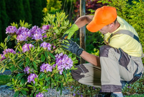 Gardener preparing an outdoor service arrangement