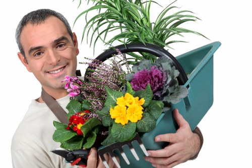 Garden waste being measured for a cubic-yard pricing estimate